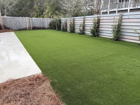 Artificial turf and landscaping by Fénix Paver Landscape, Miramar Beach FL